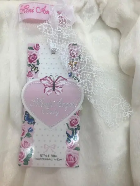 Foto aus der offiziellen Meldung: Mini Angel Baby STYLE GIRL ORIGINAL NEW Kleidungsset für Mädchen — Risiko: Strangulierung