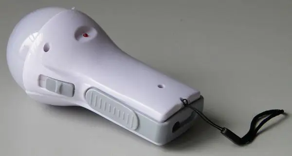 Photo from the official notice: YANUO Rechargeable LED Energy-saving lamp portable led lamp/torch — electric shock & fire risk