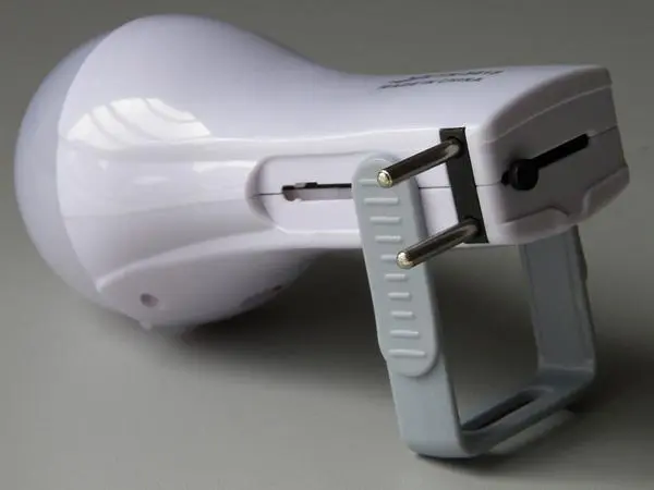Photo from the official notice: YANUO Rechargeable LED Energy-saving lamp portable led lamp/torch — electric shock & fire risk