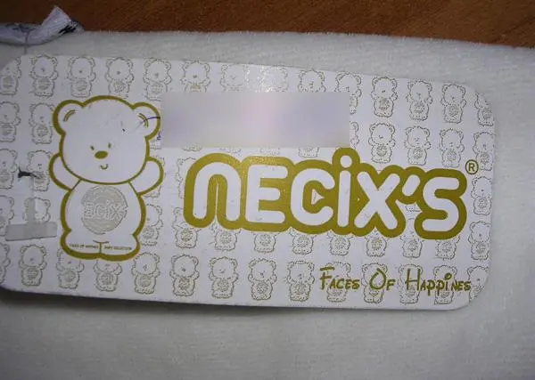 Photo from the official notice: Necix's babies' clothing set — choking risk (A12/1833/18)