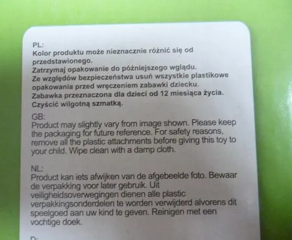 Photo from the official notice: ECOTOYS Drewniany piesek na sznurku pull-along toy — strangulation risk