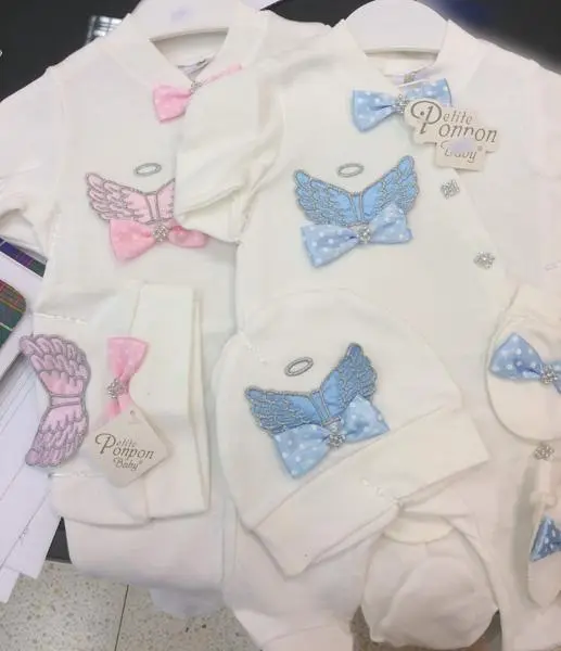 Foto do aviso oficial: Petite Ponpon Baby Conjunto de roupas para bebés — risco: Engasgamento