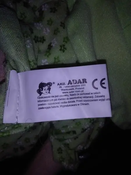 Photo from the official notice: Adar Lalka z dzwiekiem (PL) soft textile doll — choking & suffocation risk