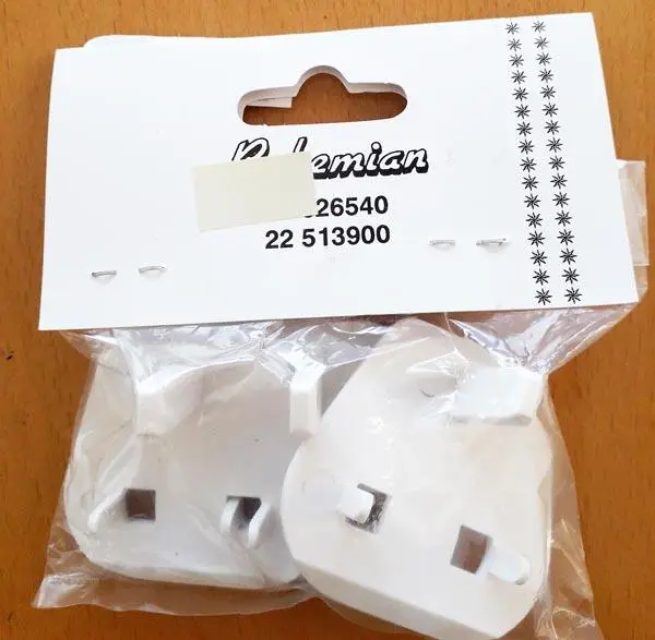Photo from the official notice: Bohemian, L.H electrical socket adaptor — electric shock risk