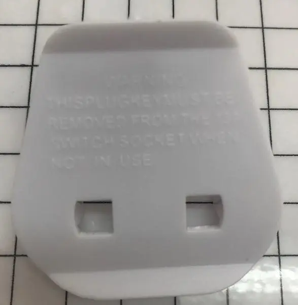 Photo from the official notice: Electrical socket adaptor — electric shock & fire risk