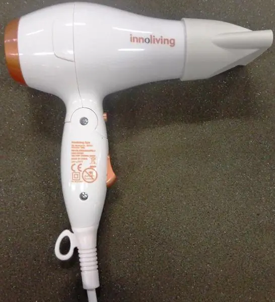 Photo de l’avis officiel: Innoliving Travel hair dryer Sèche-cheveux — risque: Choc électrique