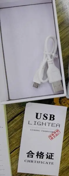 Photo de l’avis officiel: LIGHTER, USB, CLASSIC FASHIONABLE, SERTIFICATE Plus léger — risque: Dommages à la vue