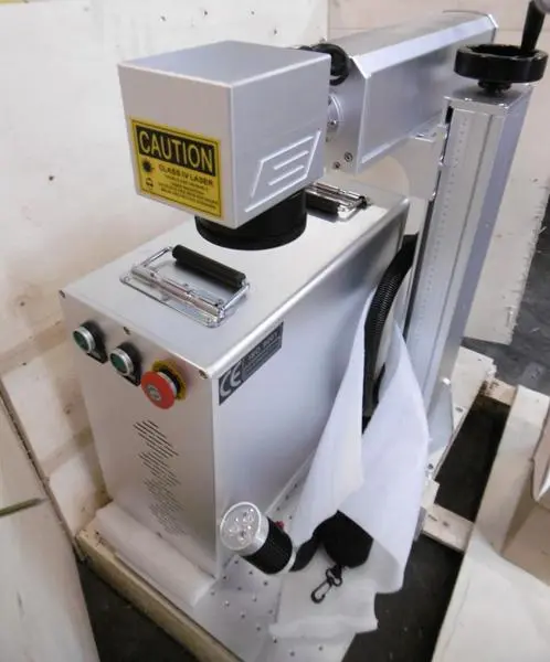 Photo de l’avis officiel: Jinan Link Manufacture &amp; Trading Co., Ltd JNLINK LXF-30W Machine de gravure laser — risque: Dommages à la vue & Blessures