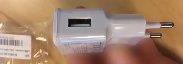 Photo de l’avis officiel: Travel Adapter USB-Charger — risque: Choc électrique