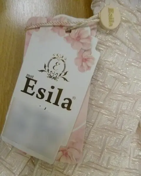 Photo de l’avis officiel: Esila Robe d’enfant — risque: Étouffement
