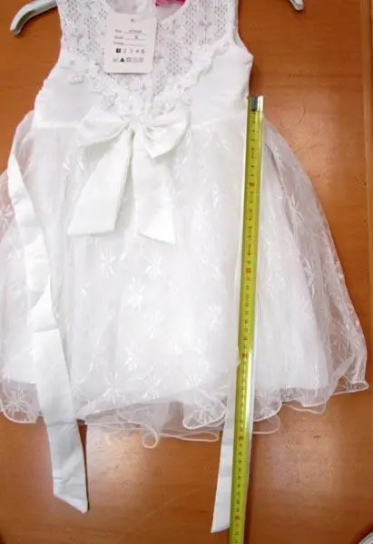Foto aus der offiziellen Meldung: M &amp; S Kleid für Mädchen — Risiko: Verletzungen (A12/1055/19)