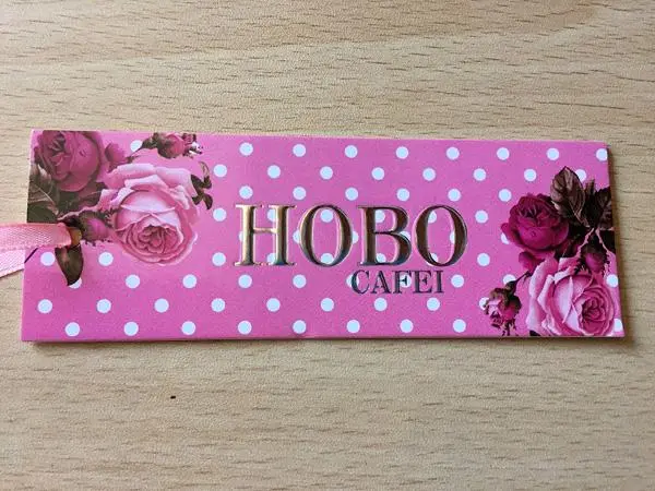Foto aus der offiziellen Meldung: Hobo Cafei Kinderkleidungsset — Risiko: Ersticken