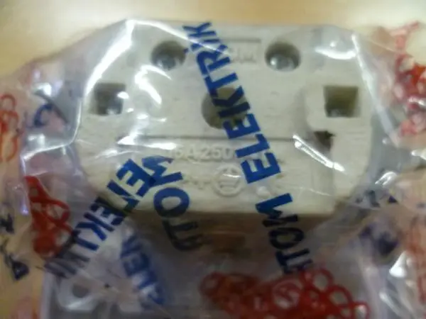 Foto do aviso oficial: ATOM ELEKTRIK Tomada de parede — risco: Choque elétrico
