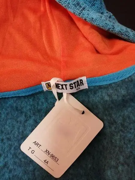 Photo from the official notice: NEXT STAR children's jacket — strangulation risk