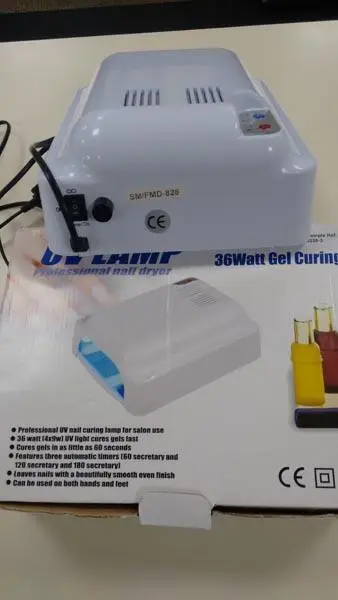 Foto do aviso oficial: 36WATT Gel curing professional nail dryer Lâmpada de unhas UV — risco: Choque elétrico