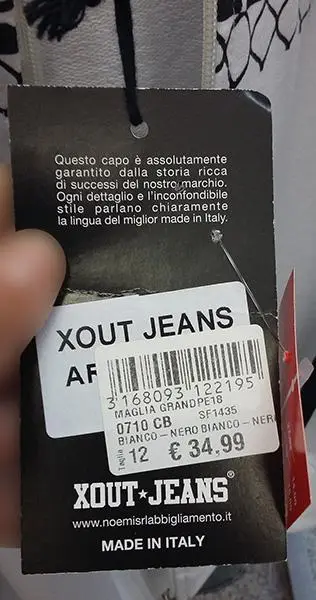 Foto uit de officiële melding: XOUT Jeans Kinder trainingspak — risico: Verwurging