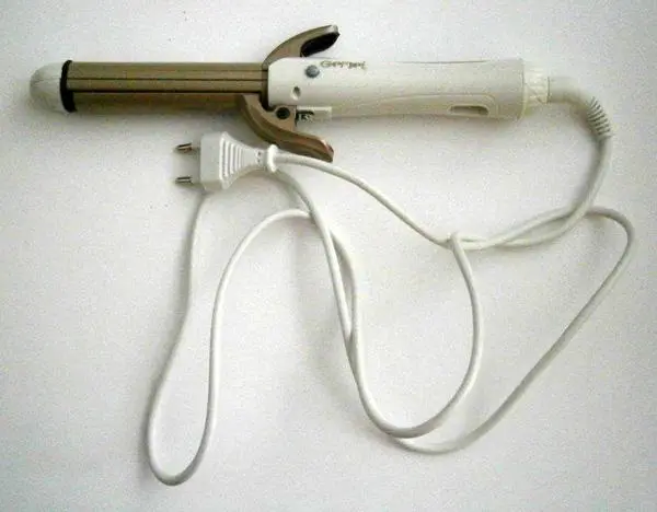 Foto uit de officiële melding: Gemei Hair straightener and curling iron Haarstang/Haar krullend strijkijzer — risico: Elektrische schok