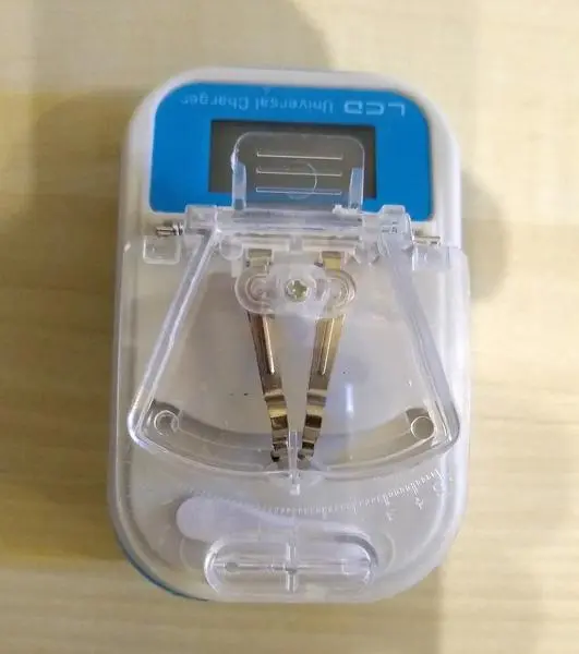 Photo from the official notice: ATRAX Universal Charger — electric shock risk