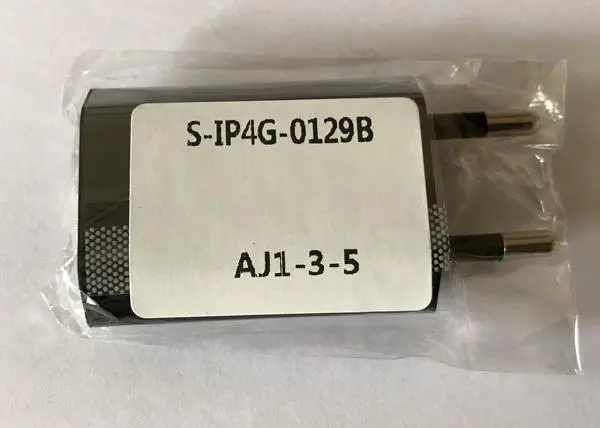 Foto uit de officiële melding: USB-oplader — risico: Milieu