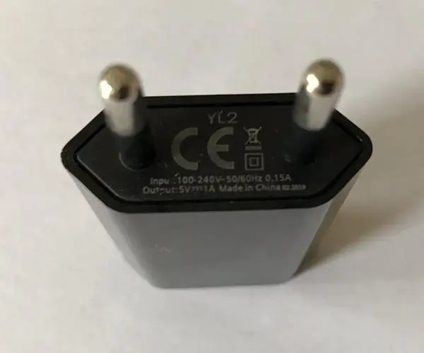 Foto uit de officiële melding: USB-oplader — risico: Milieu