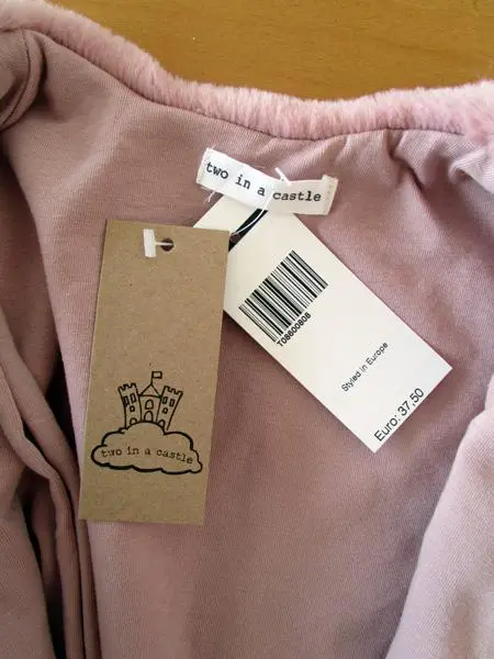 Foto dell’avviso ufficiale: Two in a castle Cardigan per bambini — rischio: Strangolamento (A12/1714/19)