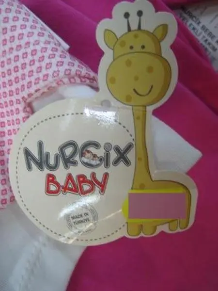 Foto del aviso oficial: Nurcix Conjunto de ropa para bebés — riesgo: Atragantamiento