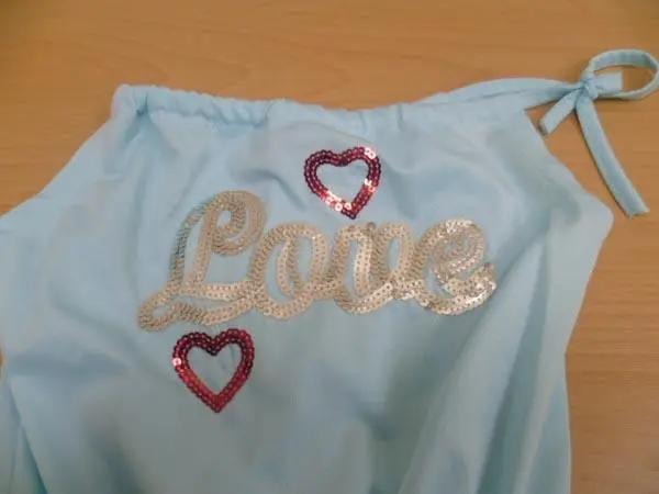 Photo from the official notice: Narnia kids children´s jumpsuit — injuries & strangulation risk