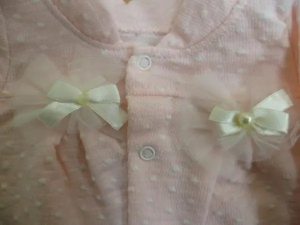 Foto aus der offiziellen Meldung: HIPPIL Kinderkleidungsset — Risiko: Ersticken