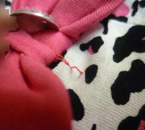 Foto aus der offiziellen Meldung: Modimix Kinderkleidungsset — Risiko: Ersticken