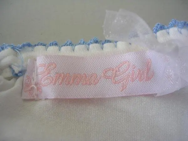 Foto do aviso oficial: Emma Girl Conjunto de roupas para meninas — risco: Engasgamento