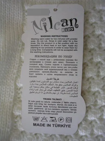 Foto do aviso oficial: Nilcan Sobretudo de lã para raparigas — risco: Engasgamento (A12/1779/17)