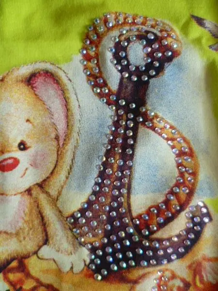 Foto aus der offiziellen Meldung: Almi Kinder T-Shirt — Risiko: Ersticken