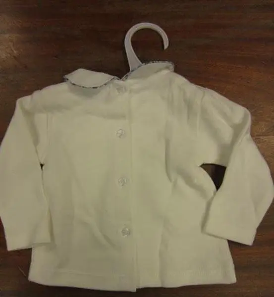 Photo from the official notice: PICK OUIC babies' clothing set — choking risk