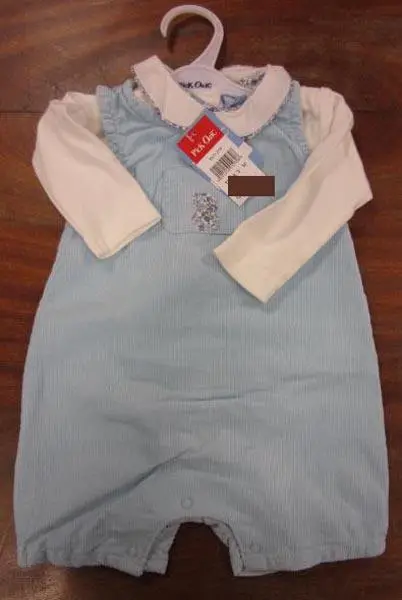 Photo from the official notice: PICK OUIC babies' clothing set — choking risk