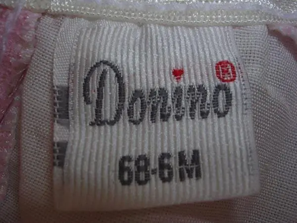 Photo from the official notice: Donino babies' clothing set — choking risk