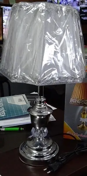 Photo de l’avis officiel: Table Light Lampe de table — risque: Choc électrique