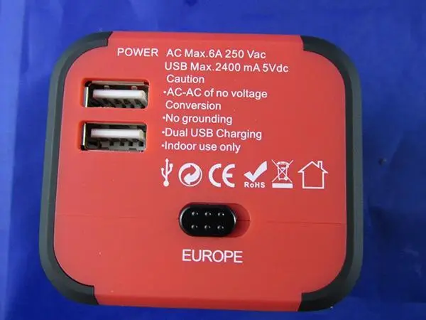 Foto do aviso oficial: Travel Adapter with USB Adaptador de viagem — risco: Choque elétrico