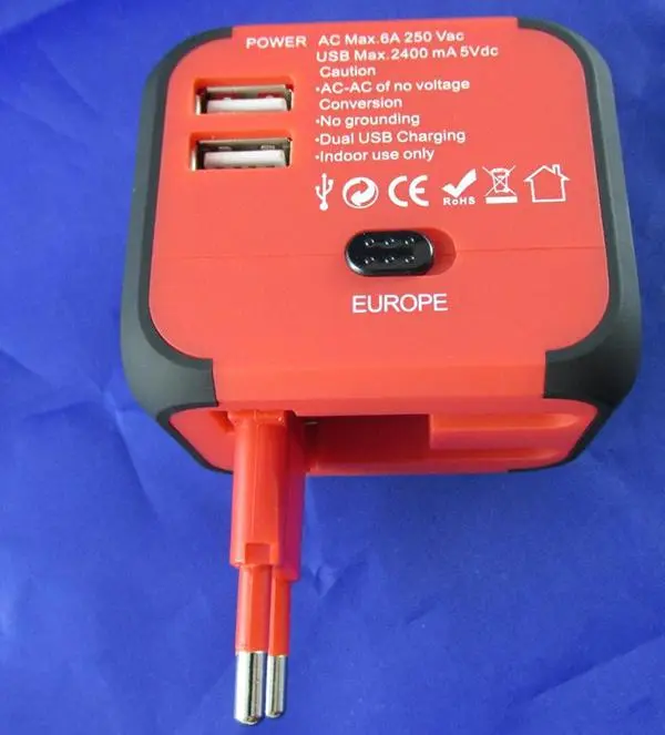 Foto do aviso oficial: Travel Adapter with USB Adaptador de viagem — risco: Choque elétrico
