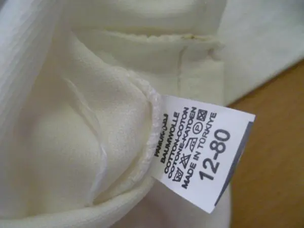 Photo from the official notice: Hoppi babies' clothing set — choking risk