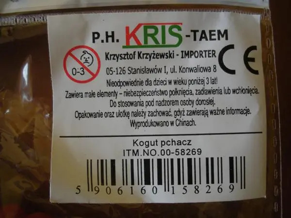 Foto aus der offiziellen Meldung: P.H. Kris TAEM Funny Toys / Kogut pchacz Push-along Spielzeug — Risiko: Ersticken