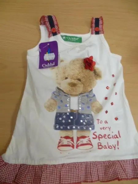 Foto aus der offiziellen Meldung: Cichlid Kinderbekleidung Set — Risiko: Ersticken