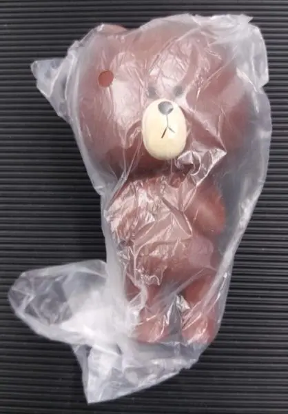 Photo from the official notice: Super Cute 11CM Squishy Brown Bear squeezable toy — choking & suffocation risk
