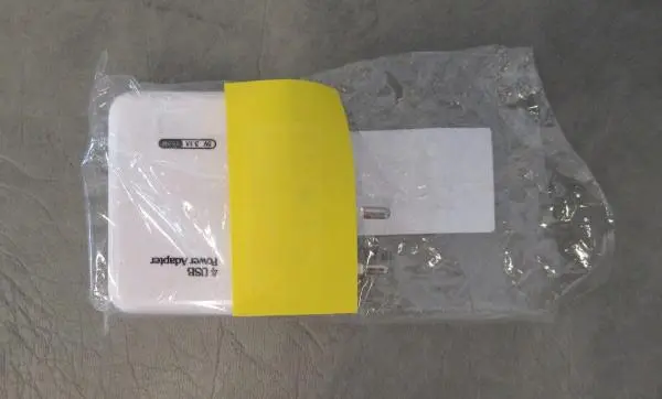 Foto dell’avviso ufficiale: 4 USB Power Adapter Caricabatterie USB — rischio: Scossa elettrica (A12/1593/18)