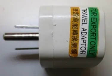 Photo from the official notice: AU/UK/EU to US Travel Adaptor — electric shock risk