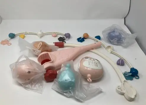 Photo from the official notice: Cot Mobile Projection Hanging Toy sold via AliExpress — choking risk