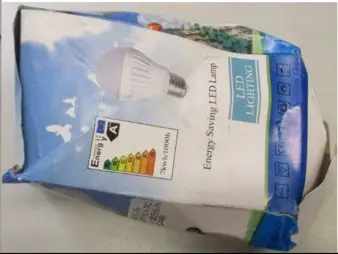Photo from the official notice: Energy Saving LED Lamp — electric shock risk
