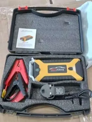 Photo from the official notice: Multi-Function Jump Starter JX27 with AC Adapter Model HR-1501000 — burns risk