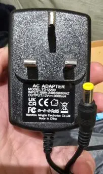 Photo from the official notice: Power Supply (Model: TD12200) supplied with InvoSpar Massager, JC668 sold via Amazon — fire risk