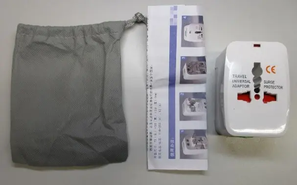 Photo from the official notice: UK/US/AU/EU Universal to AC Power Plug Adaptor — electric shock risk