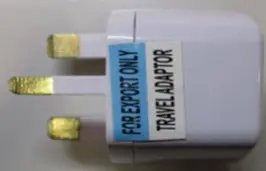 Photo from the official notice: Universal EU/US to UK Plug Converter — electric shock risk
